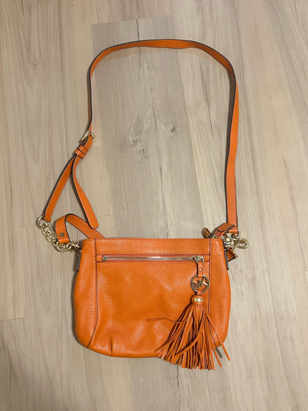 Michael Kors Orange Pebbled Leather Crossbody with Tassel Charm